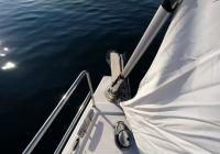 sailing yacht electric anchor windlass sailing boat sails furling genoa bow sea sun